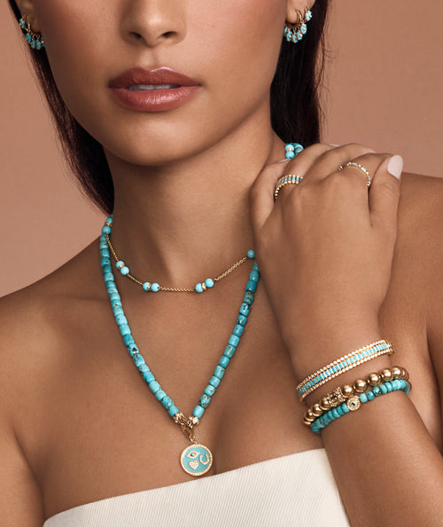 Gold & Diamond Multi Charm on Turquoise Necklace