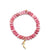 Gold & Ruby Stiletto Charm on Red Moonstone