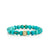 Gold & Diamond Baguette and Round Bezel Stacked Rondelle on Matrix Turquoise