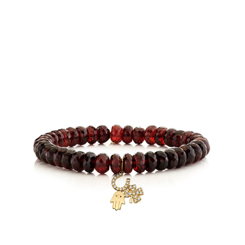 Gold & Diamond Luck and Protection Charm on Garnet