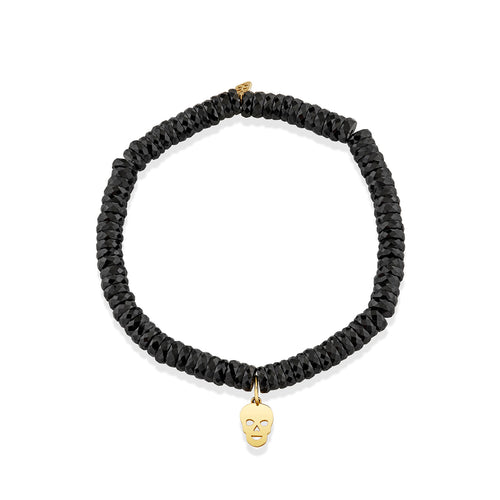 Pure Gold Tiny Skull Charm on Black Spinel