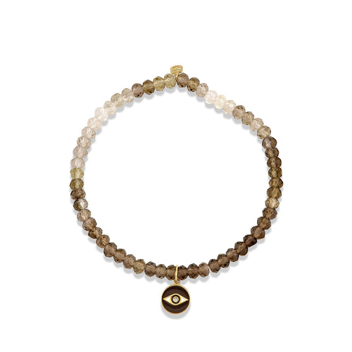 Gold & Diamond Eye Coin on Shaded Quartz