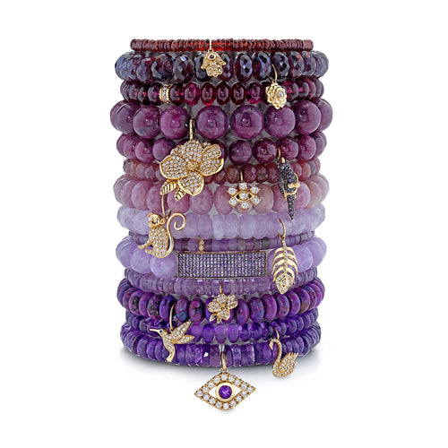 Gold & Diamond Hamsa on Garnet