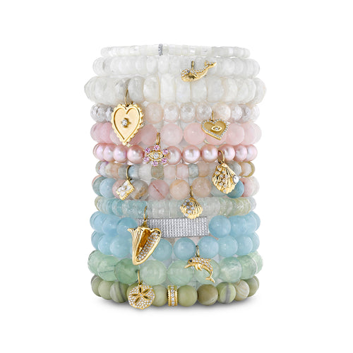 Gold & Diamond Dolphin Charm on Aquamarine