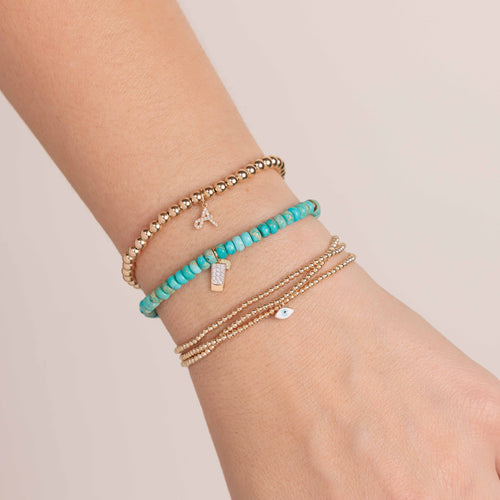 Gold & Diamond Tequila Shot on Turquoise