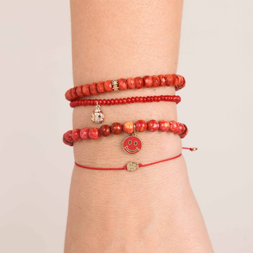 Gold & Diamond Ladybug on Red Bamboo Coral