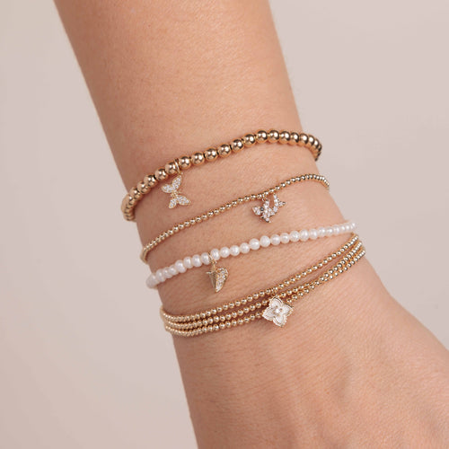 Gold & Diamond Tiny Butterfly On Gold Beads