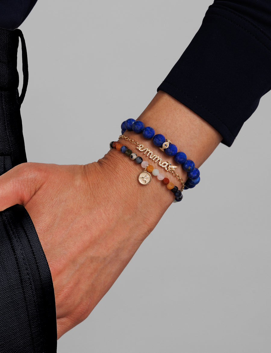 Gold & Diamond Bezel Eye Rondelle on Lapis