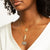 Gold & Diamond Eye Coin Charm